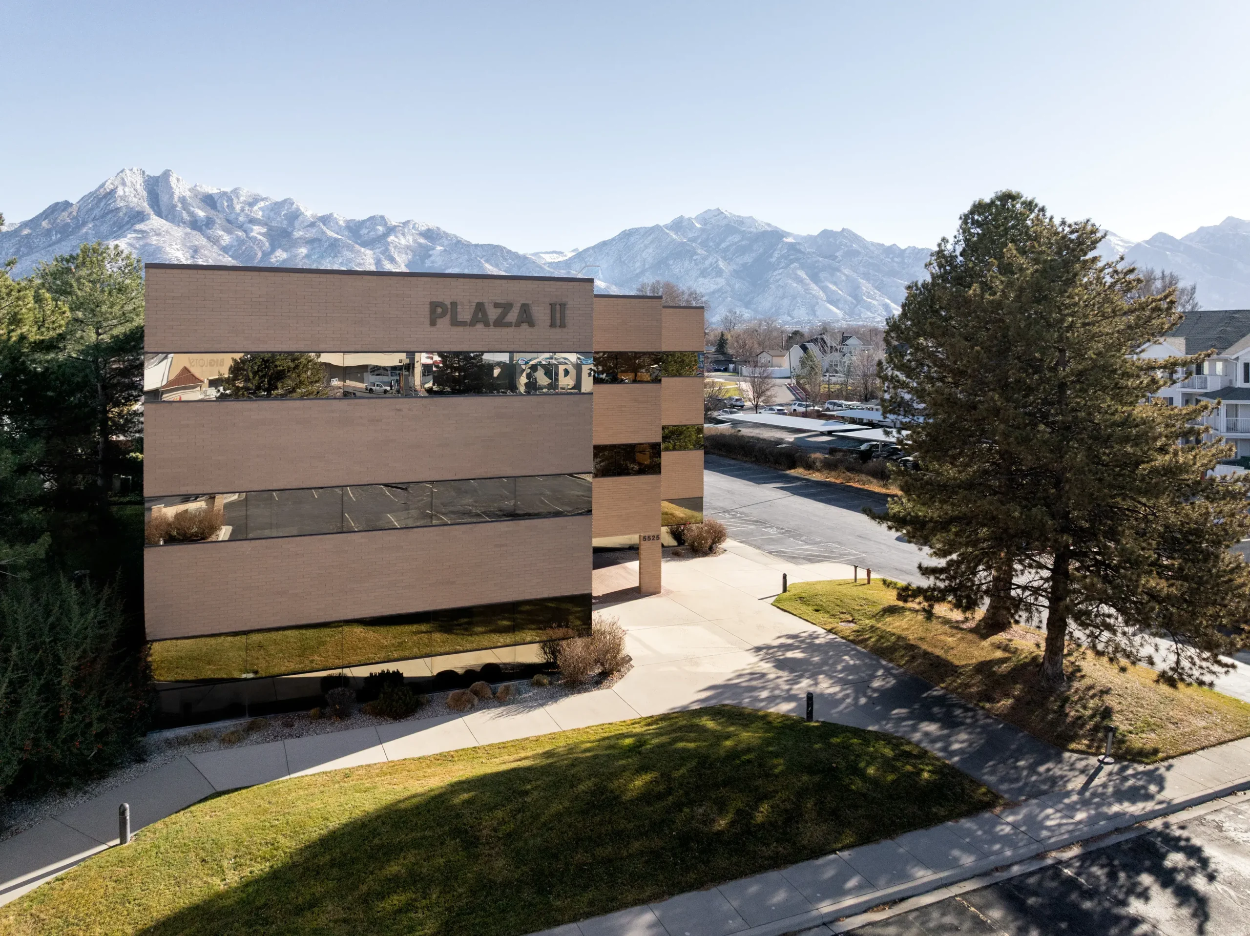 Salt Lake City South East Building with Mountainous Background